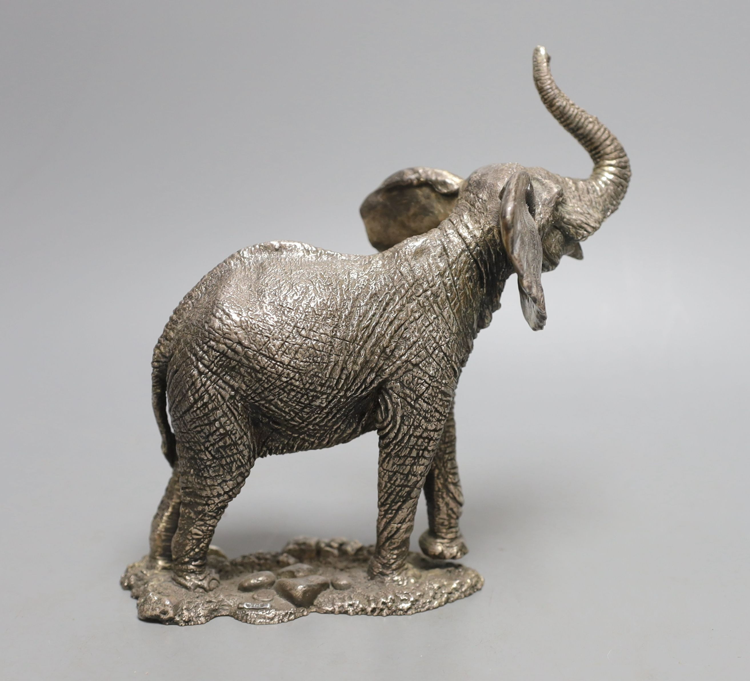 A modern miniature silver model of an elephant, maker CA, (filled), height 19cm.